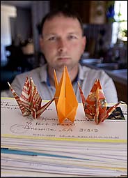 kevin benderman with japanese peace cranes